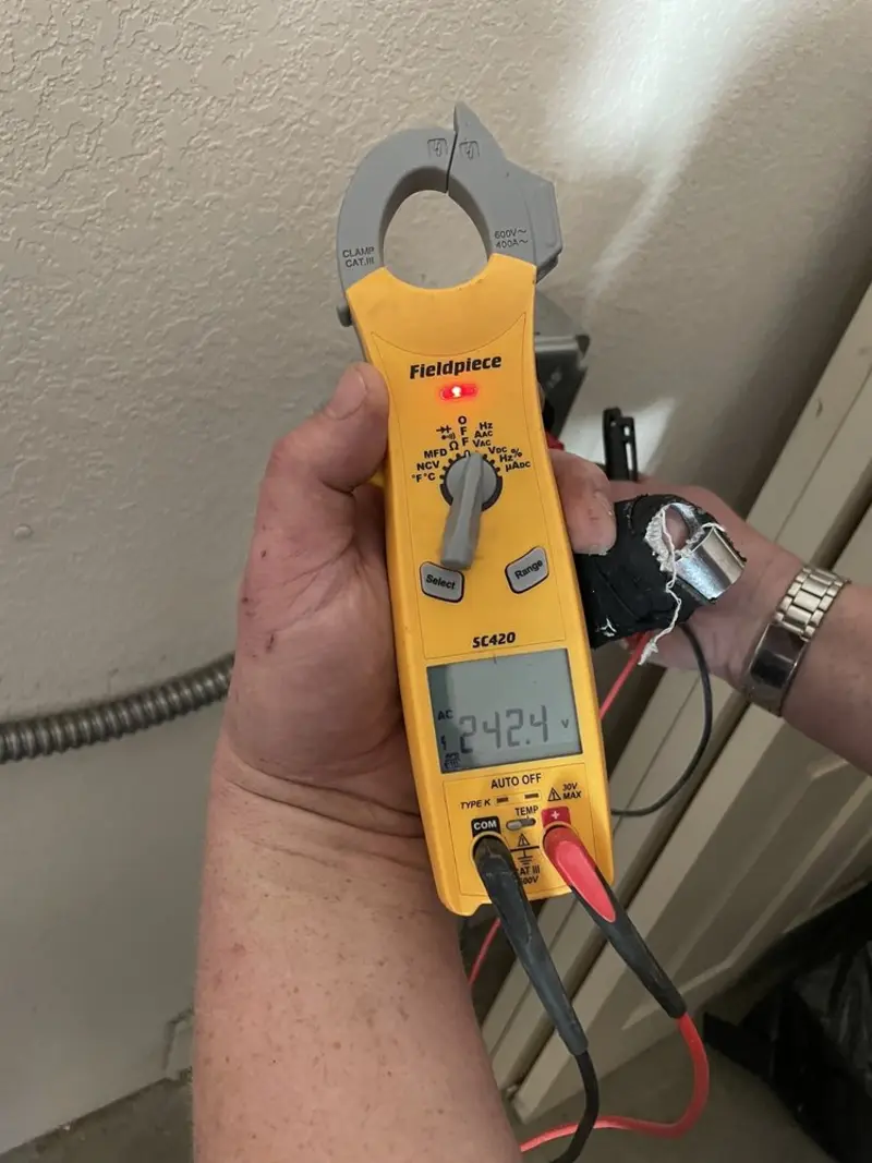 Voltage testing with clamp meter during Aluminum Wiring Replacement in Francisville